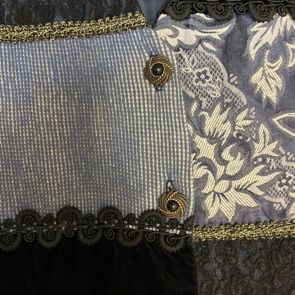 Judy Knapp Vintage vest in various shades of blue by with a printed design SizeS